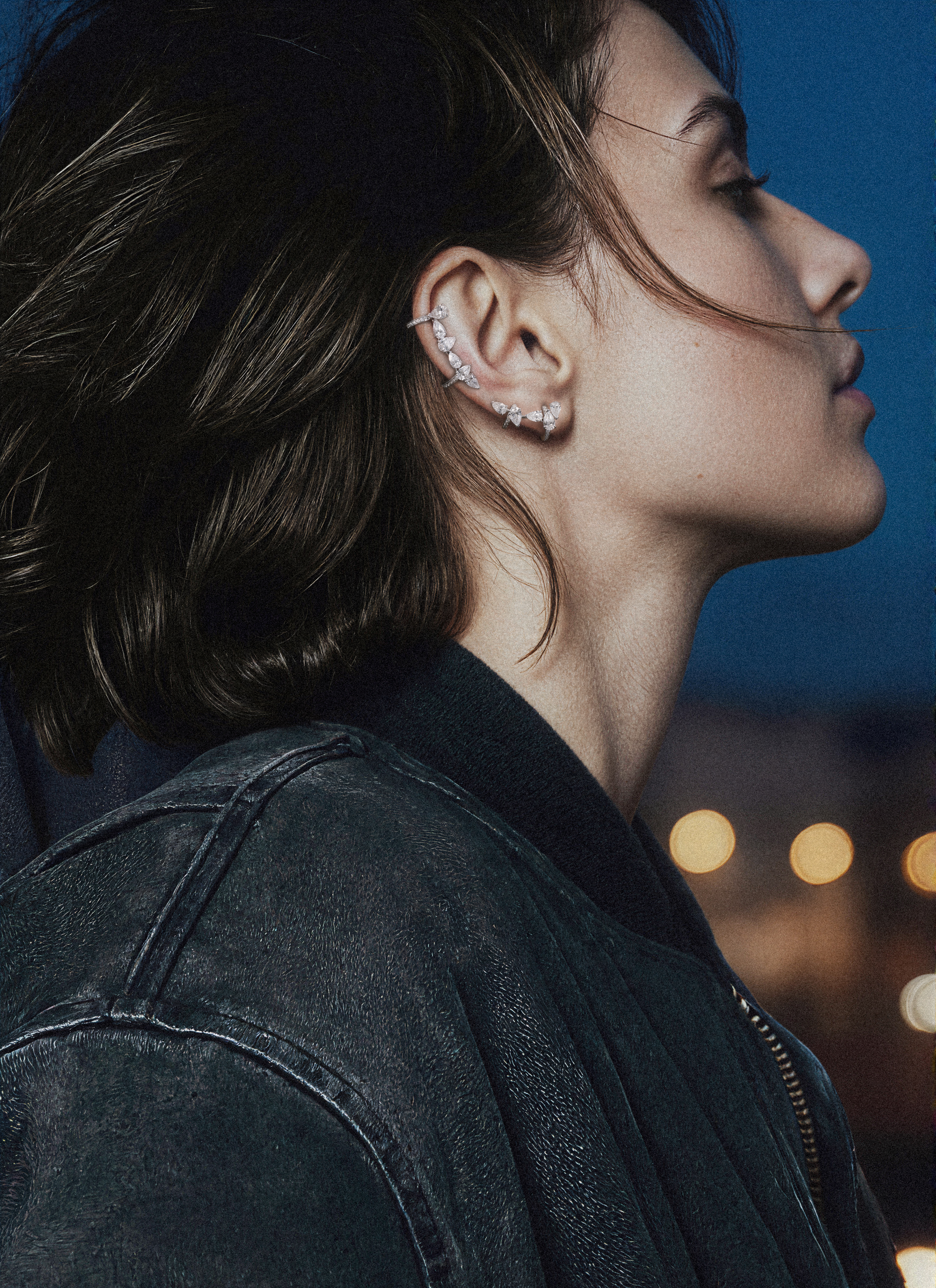 Repossi — key visual centré sur une oreille et un bijou